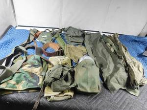 lot 9 image: Box of military pouches, face mask, hat, and more