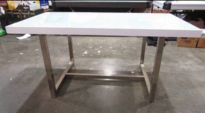 lot 23 image: Signature Designs for Ashley Furniture Glass Top Table