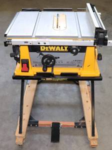 lot 3 image: DeWalt DW744 10 Table Saw, Delta Mobile Stand & 10 Blades