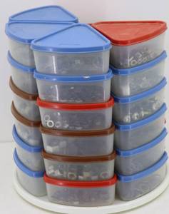 lot 44 image: Vintage Tupperware Pie Carousel FULL of nutswashersbolts