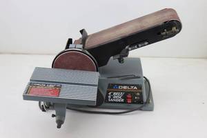 lot 105 image: Delta 31-460 4 Belt & 6 Disc Sander