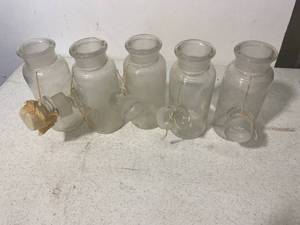 Five Vintage Glass bottles with stoppers
