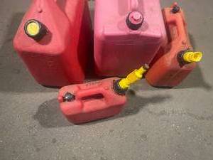 4 Various Sized Gas Cans