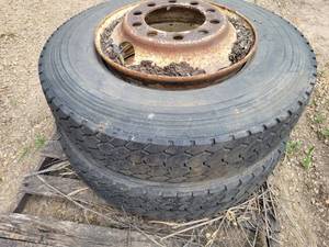 lot 9 image: (2) 10R22.5 Tires with 10-Bolt Steel Rims