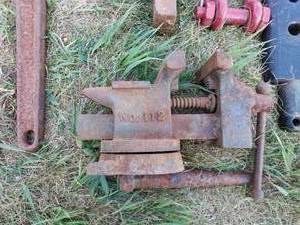 lot 56 image: Heavy Duty Chain Binder, vise, and John Deere Manure Fork Teeth