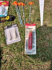 lot 93 image: Hangers, Driveway Markers, Vinyl Siding Removal Tool