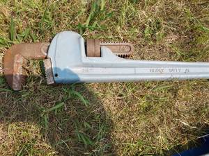 lot 71 image: Pipe Wrench and Caulking Guns