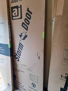 lot 1069 image: Lowkick Storm Door 415-3351 30x68