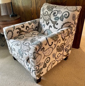 lot 7 image: Upholstered Ashley Furniture Company Accent Chair