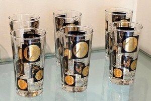 lot 59 image: Set of Seven Mid Century Modern Libbey Coins of the World Tumblers