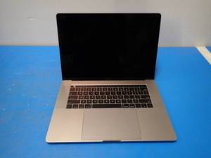 lot 24 image: Apple&nbspMacBookPro14,3 A1707 MPTR2LLA &nbspINTEL(R) CORE(TM) I7-7700HQ CPU  2.80GHZ  16GB LPDDR3 SDRAM  251GB SSD  15 screen 3360 x 2100 resolution  Includes IOS  No charger