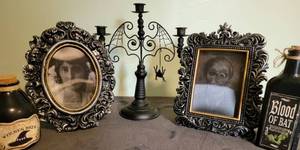 lot 96 image: Halloween decor 2 moving pictures, 1 candelabra, 2 potion bottles