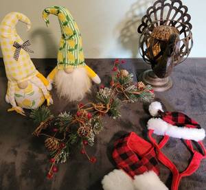 lot 101 image: 2 Lemon gnomes, Christmas garland, catsmall dog christmas hat and scarf, turkey candle holder