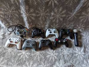 lot 192 image: Assorted Game System Controllers