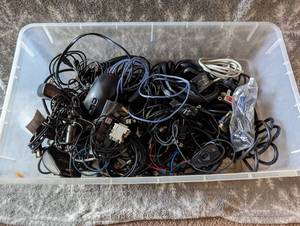 lot 195 image: Misc powercords, charging cords, and headsets