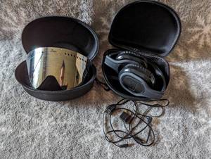 lot 201 image: Gonex goggles, and Ilive head set with cords and adapter