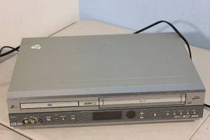 lot 218 image: Used VCRDVD Player Combo Film Prop Used in The Claw Short Film - Possibly Haunted