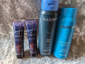 lot 206 image: 2-4oz bottles Sparkle and Shine Tail Tamer, Harrys Body Wash, and Harrys anti-dandruff 2 in1 shampoo and conditioner