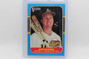 lot 49 image: Mark McGwire Rookie Donruss 87 No. 54 - Donruss A.L. Rookie of the Year