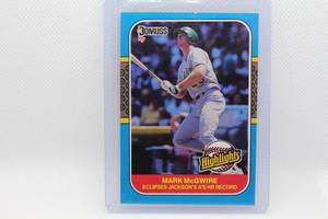 lot 50 image: Mark McGwire Rookie Donruss 87 No. 43 - Eclipses Jacksons As HR Record