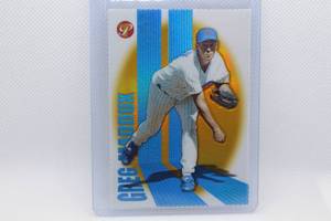 lot 86 image: Greg Maddux 2004 Pinnacle No. 35 Gold Refractor Numbered 3341