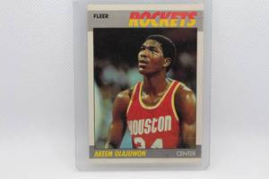 lot 103 image: Akeem Olajuwon 1987 Fleer No. 80 of 132