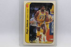 lot 115 image: Magic Johnson 1986 Fleer Sticker No. 7 of 11