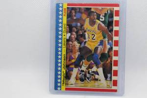 lot 116 image: Magic Johnson 1987 Fleer Sticker No. 1 of 11