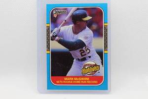 lot 208 image: Mark McGWire Rookie Donruss 87 No. 27 - Sets Rookie Home Run Record