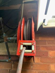 lot 54 image: Wall mounted Air Hose Reel