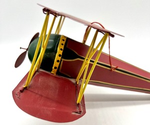 lot 112 image: Vintage Hanging Metal Antique Toy Airplane
