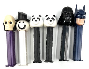 lot 148 image: Vintage PEZ CANDY DISPENSERS - Halloween DR. SKULL, Christmas SNOWMAN, PANDA BEARS, DARTH VADER & BATMAN