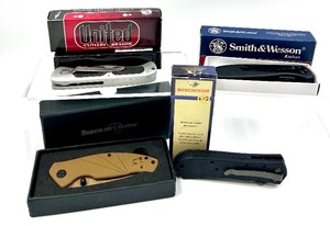 lot 176 image: 4 Tactical  Folding  Utility Knifes by UNITED CUTLERY BRANDS, WINCHESTER, SMITH & WESSON and TIMBERLINE