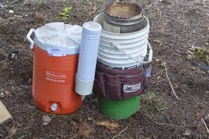 lot 24 image: Rubbermaid 5-Gallon Cooler Water Dispenser, & Various 5 gallon buckets