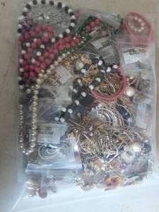 lot 9 image: Bag Lot Of Assorted Jewelry Necklaces, Earrings, Brooches