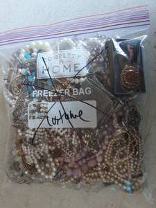 lot 11 image: Bag Lot Of Assorted Jewelry