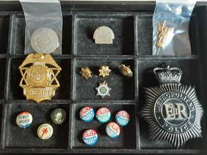 lot 30 image: Collection Of Police & Sheriff Pins, Chauffer Pin & More