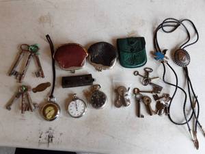 lot 34 image: Pocket Watches, Old Skeleton Keys, Railroad Keys, Bolo Ties, Leather Coin Purses