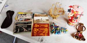 lot 38 image: Vintage Wind Up Toy, Postcards, Marbles, Brass Door Knocker & Portugal Ship