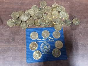 lot 43 image: 48-Brass Replica Presidential Dollars