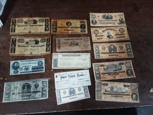 lot 49 image: Assorted Confederate Replica Dollars