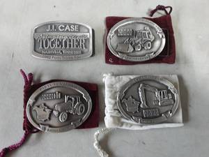lot 58 image: 4-Case IH Pewter Belt Buckles Trade Fair 1989,1990, 1992