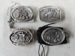 lot 62 image: 4-Case Tractor Belt Buckles