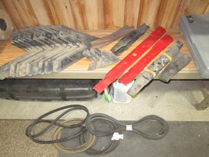 lot 18 image: Belts, Cultivator Sweeps, Mower Blades