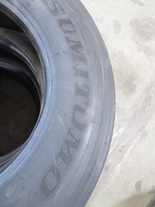 lot 15-A image: (3) Sumitoma 26570R 19.5 Step DeckSpray Tender Trailer Tires