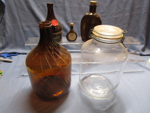 lot 127 image: Amber Bottles, Clear Storage