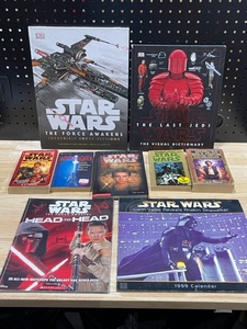 lot 47 image: Star Wars Books and 1999 Calander
