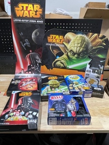 lot 50 image: Star Wars Pancake Set, Cereal Boxes, Cracker Box, Jello Molds, Display Signs, and VHS Tape