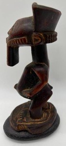 Vintage Senufo Tribal African Wood Carving Mounted on a Rock