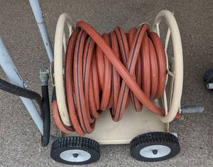 lot 98 image: Pair of Rolling Hose Carts